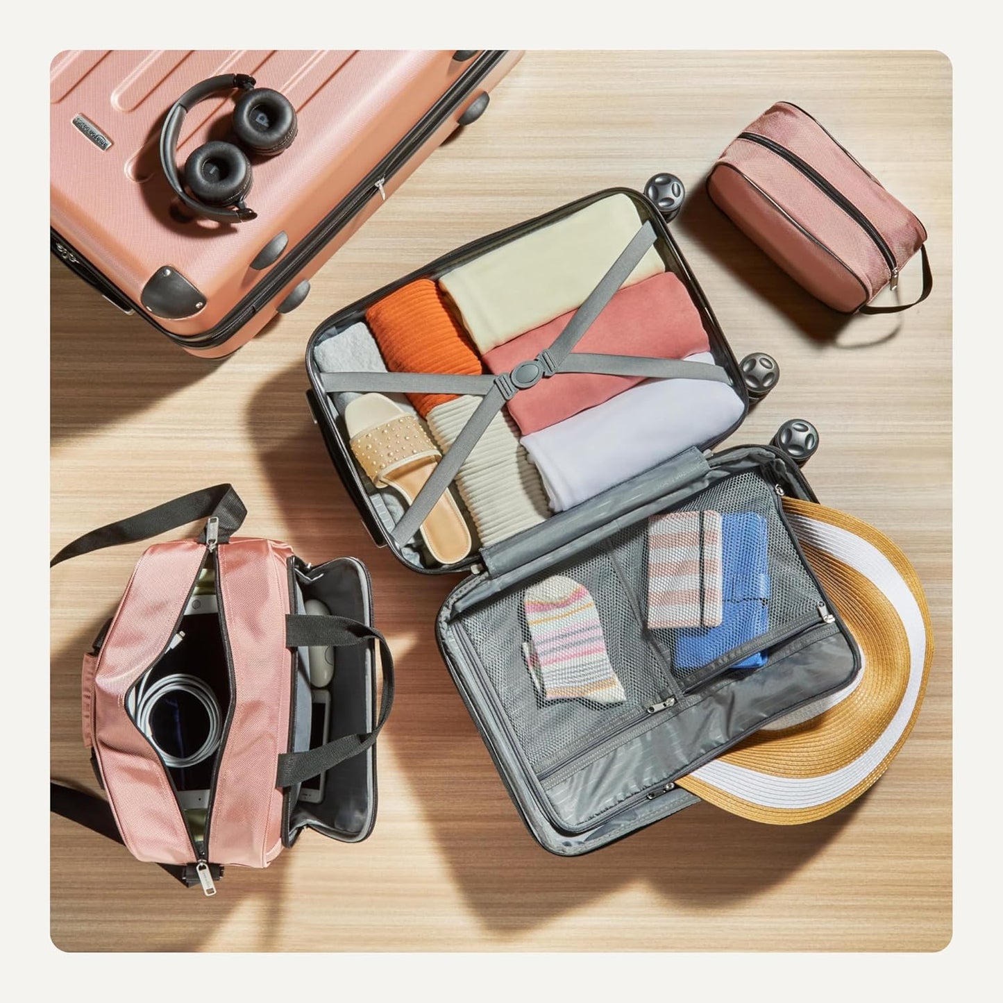 Amazon Basics 4-Piece Luggage Set, Including Two Hardside Suitcases With Multidirectional Spinner Wheels (22" CarryOn and 28" Checked), Plus 15-inch Tote Bag and 10-inch Compact Travel Bag, Rose Gold