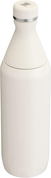 Stanley All Day Slim Bottle 20 oz | Twist On Lid with Leakproof Seal | Slim Design for Travel & Gym | Insulated Stainless Steel | BPA-Free | Cream