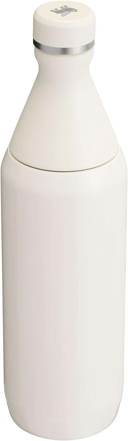 Stanley All Day Slim Bottle 20 oz | Twist On Lid with Leakproof Seal | Slim Design for Travel & Gym | Insulated Stainless Steel | BPA-Free | Cream
