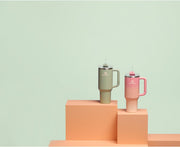 STANLEY Quencher H2.0 Tumbler with Handle and Straw 40 oz | Flowstate 3-Position Lid | Cup Holder Compatible for Travel | Insulated Stainless Steel Cup | BPA-Free | Pink Mesa Sunset