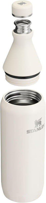 Stanley All Day Slim Bottle 20 oz | Twist On Lid with Leakproof Seal | Slim Design for Travel & Gym | Insulated Stainless Steel | BPA-Free | Cream