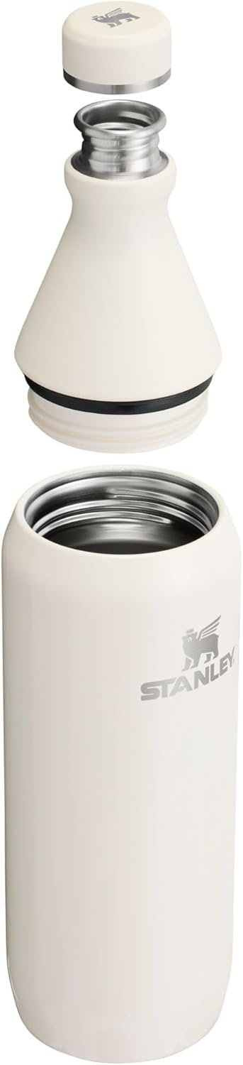 Stanley All Day Slim Bottle 20 oz | Twist On Lid with Leakproof Seal | Slim Design for Travel & Gym | Insulated Stainless Steel | BPA-Free | Cream