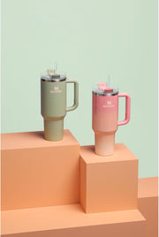 STANLEY Quencher H2.0 Tumbler with Handle and Straw 40 oz | Flowstate 3-Position Lid | Cup Holder Compatible for Travel | Insulated Stainless Steel Cup | BPA-Free | Pink Mesa Sunset