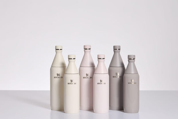 Stanley All Day Slim Bottle 20 oz | Twist On Lid with Leakproof Seal | Slim Design for Travel & Gym | Insulated Stainless Steel | BPA-Free | Cream