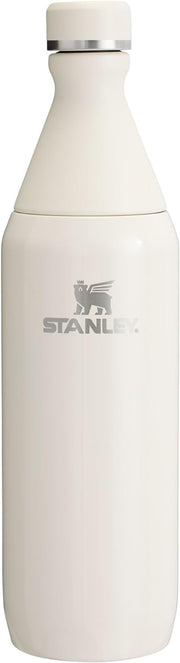 Stanley All Day Slim Bottle 20 oz | Twist On Lid with Leakproof Seal | Slim Design for Travel & Gym | Insulated Stainless Steel | BPA-Free | Cream