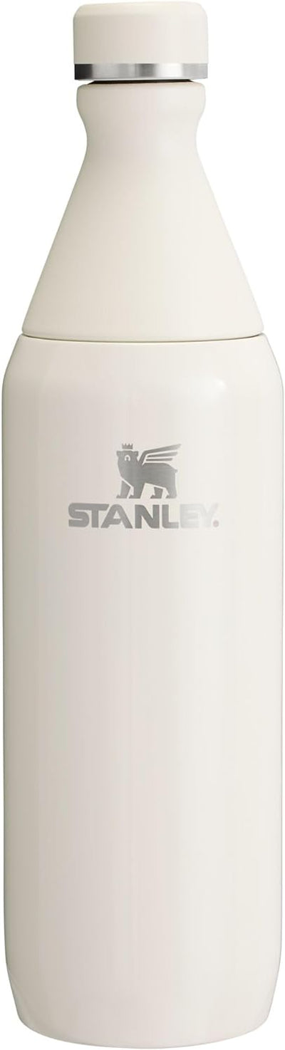 Stanley All Day Slim Bottle 20 oz | Twist On Lid with Leakproof Seal | Slim Design for Travel & Gym | Insulated Stainless Steel | BPA-Free | Cream