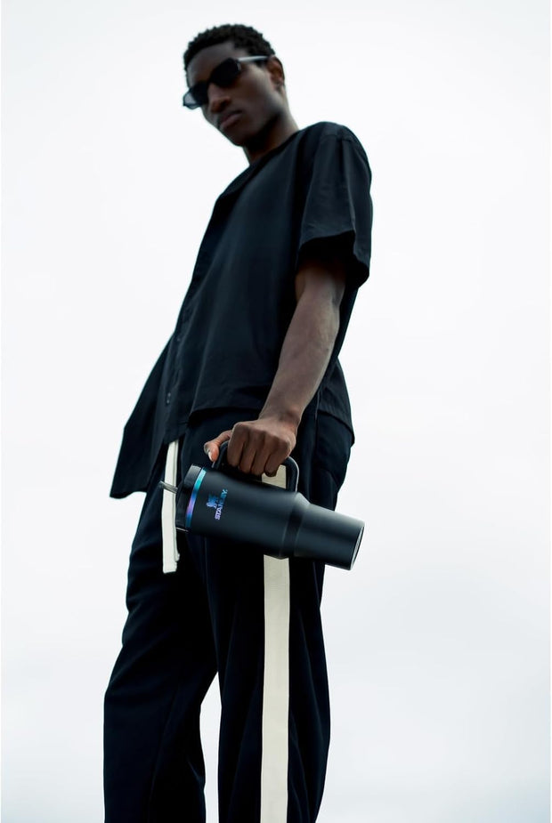 STANLEY Quencher H2.0 Tumbler with Handle and Straw 40 oz | Flowstate 3-Position Lid | Cup Holder Compatible for Travel | Insulated Stainless Steel Cup | BPA-Free | Black Chroma