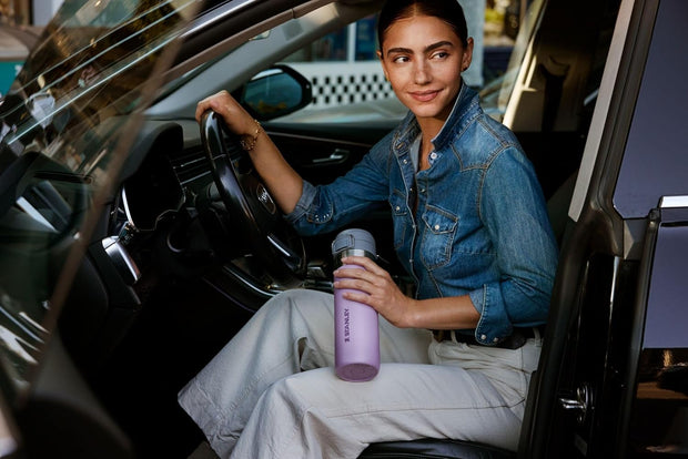 Stanley Quick Flip GO Water Bottle 36 oz | Push Button Lid | Leakproof and Packable for Travel and Sports | Insulated Stainless Steel | BPA-Free | Lilac