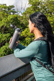 Stanley Quick Flip GO Water Bottle 24 oz | Push Button Lid | Leakproof and Packable for Travel and Sports | Insulated Stainless Steel | BPA-Free | Charcoal